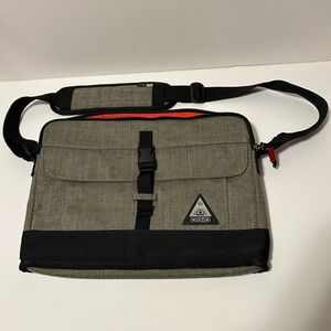 OGIO Ruck Slim Messenger Bag in Olive and Black.  Up to 15” display capacity.